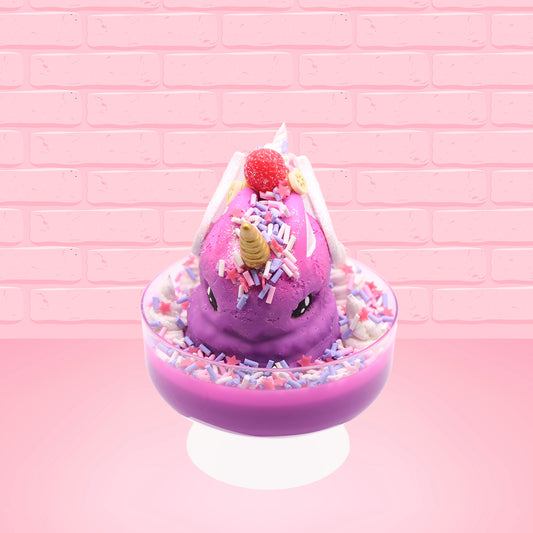 Cute kawaii unicorn purple and pink ice cream sundae with whipped cream swirls, purple, pink, white, and red star sprinkles in the dish. This unicorn bunny has white wings with a strawberry, banana slices and sprinkles on top near the whipped cream. This view is from the front.