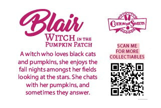 Cute kawaii witch bunny character card back which reads Blair Witch in the Pumpkin Patch, A witch who loves black cats and pumpkins, she enjoys the fall nights amongst her fields looking at the stars. She chats with her pumpkins, and sometimes they answer. A QR code is available to be scanned for more collectibles as well as the cotton tails logo.