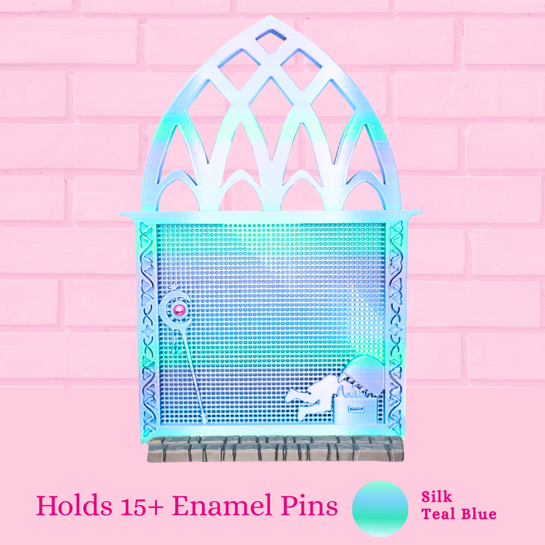 Silk Teal Blue Frieren Room enamel pin board with the words holds 15+ enamel pins.