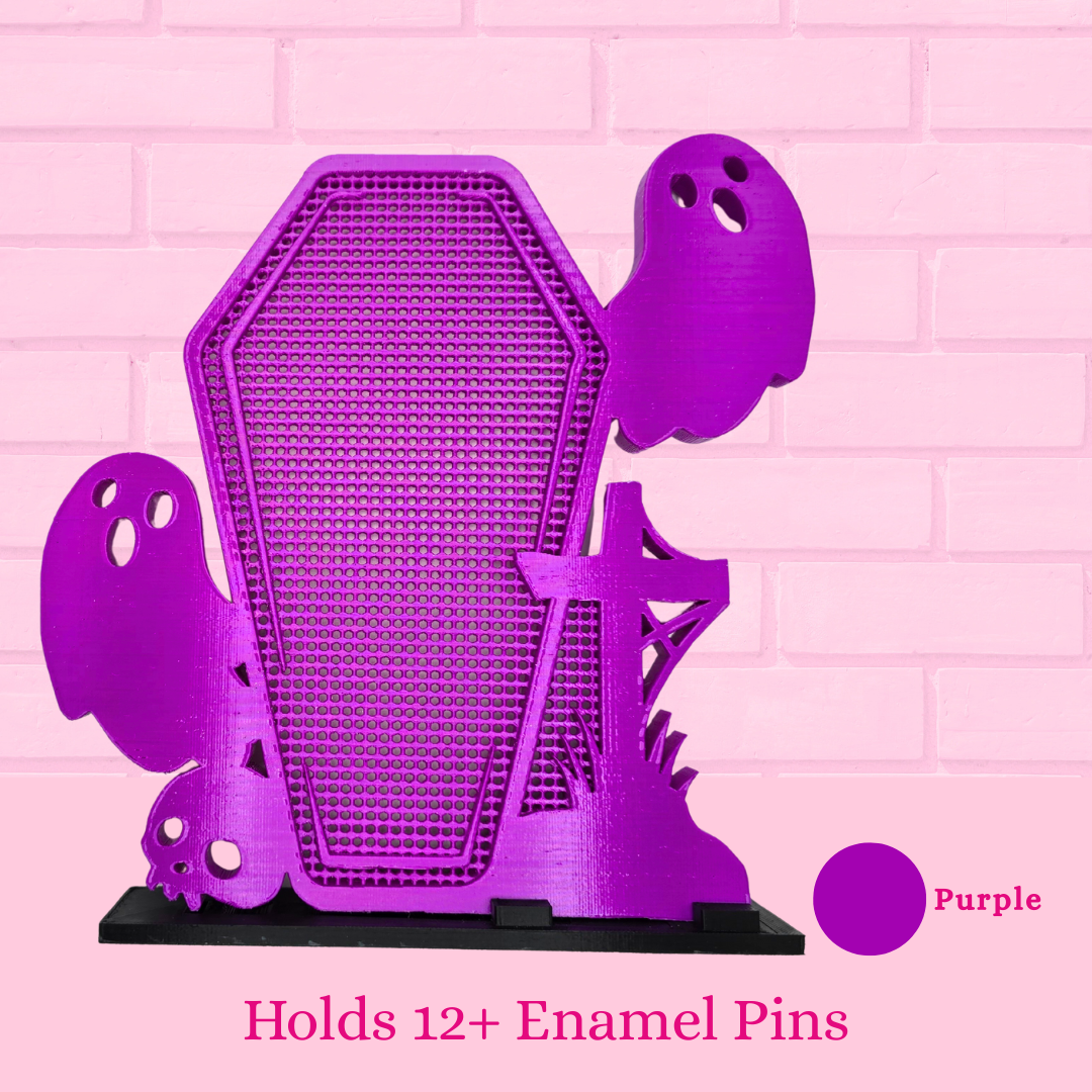 Purple Ghost Coffin with Skull/Cross enamel pin display board is shown with words holds 12+ enamel pins.