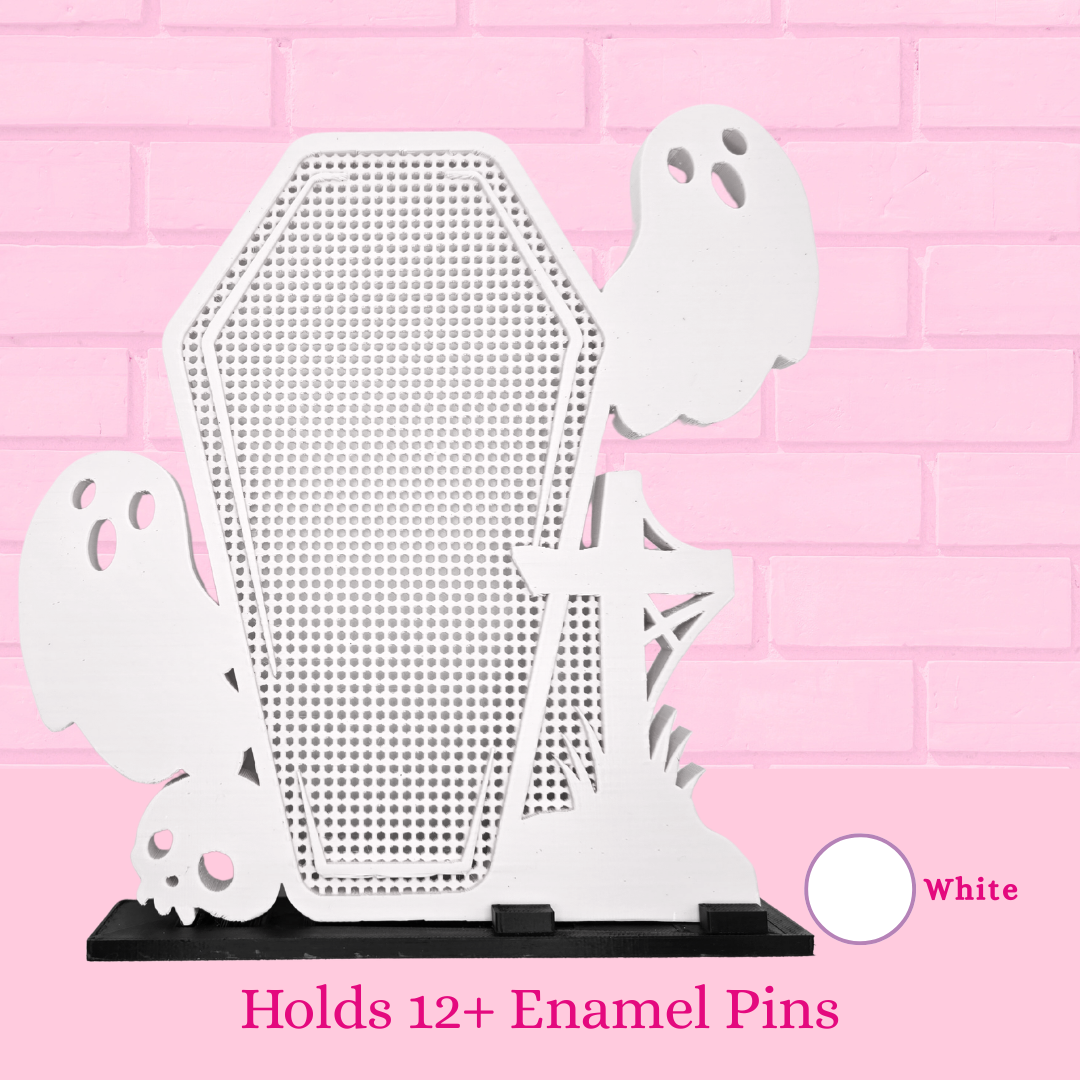 White Ghost Coffin with Skull/Cross enamel pin display board is shown with words holds 12+ enamel pins.
