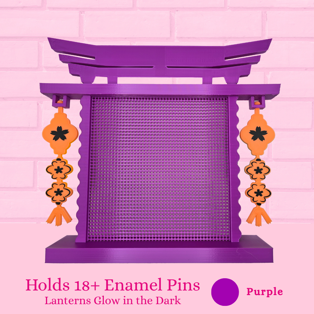 Purple with orange glow in the dark lanterns Japanese Arch enamel pin board and the words holds 18+ enamel pins.