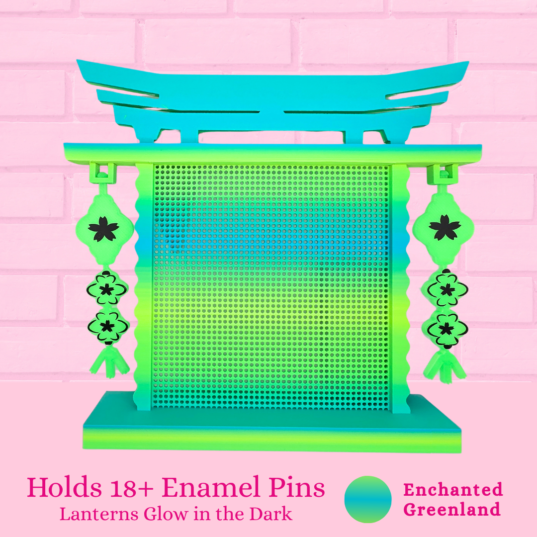 Enchanted Greenland – glow in the dark lanterns Japanese Arch enamel pin board and the words holds 18+ enamel pins.