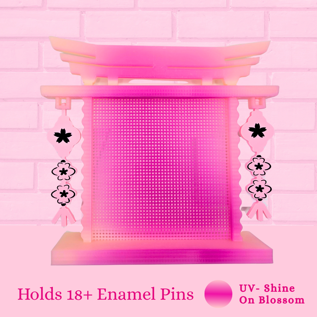 UV Shine on Blossom Japanese Arch enamel pin board and the words holds 18+ enamel pins.