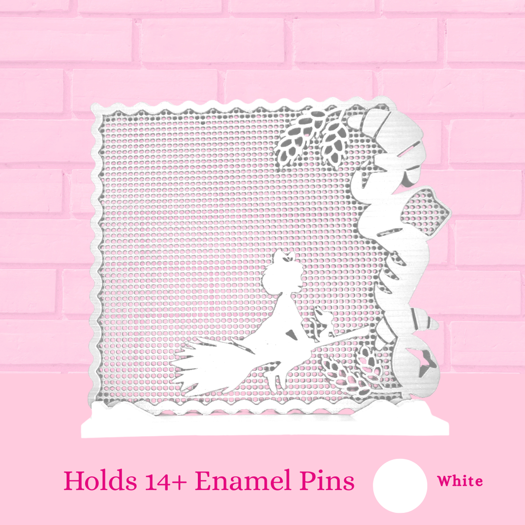 White Kiki’s Bread Bakery enamel pin board with the words holds 14+ enamel pins.