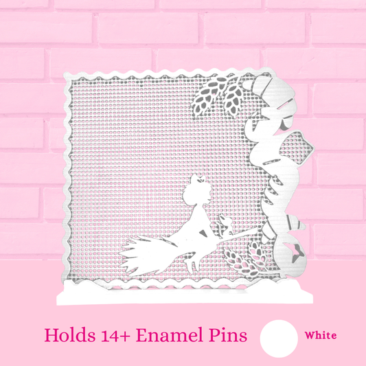 White Kiki’s Bread Bakery enamel pin board with the words holds 14+ enamel pins.
