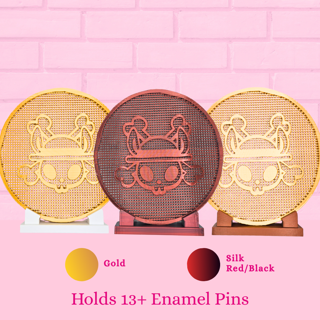 Varieties of Pirate Bunny Coin enamel pin display boards are shown, the gold, the silk red black, and the words holds 13+ enamel pins.
