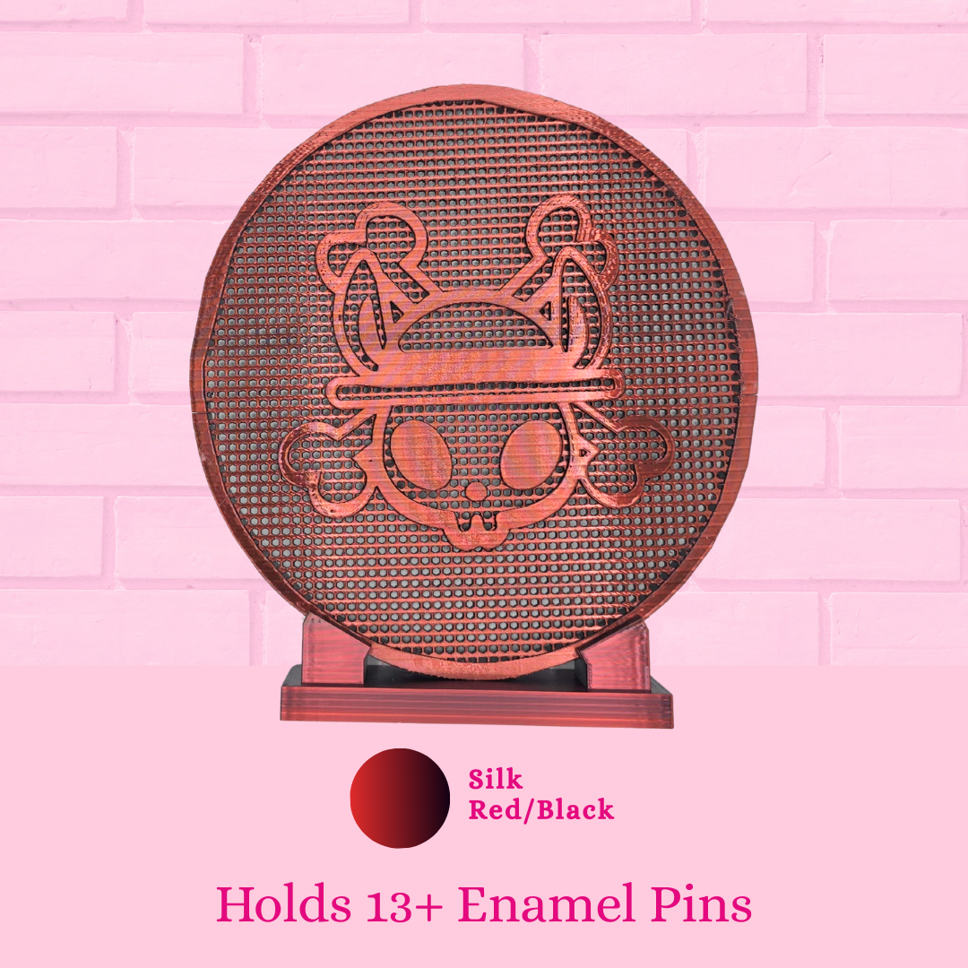 Silk Red Black Pirate Bunny Coin enamel pin display board is shown with words holds 13+ enamel pins.