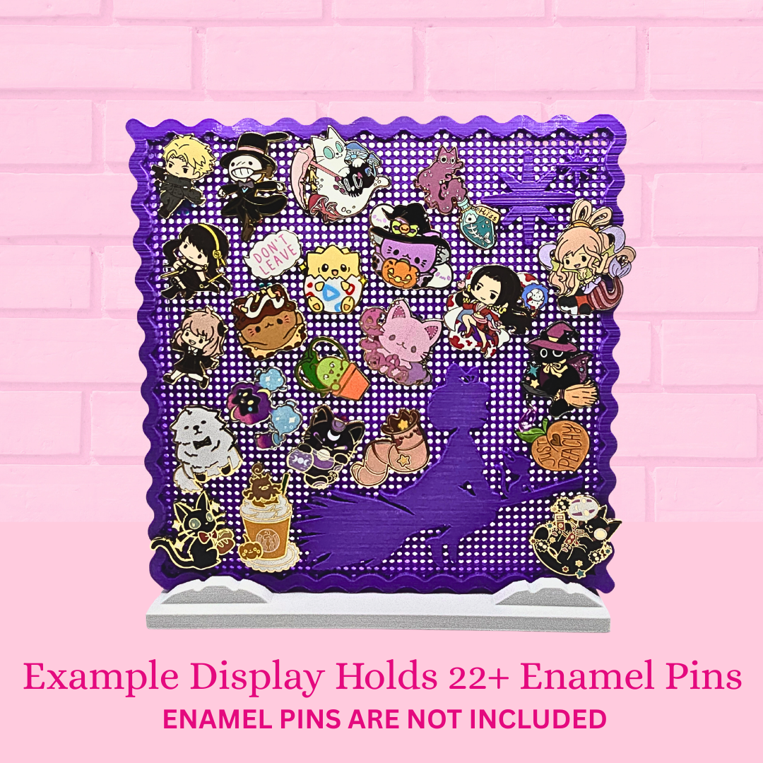Kiki's Sky enamel pin board with 23 enamel pins, with the words Example display holds 22+ enamel pins, Enamel pins are not included.
