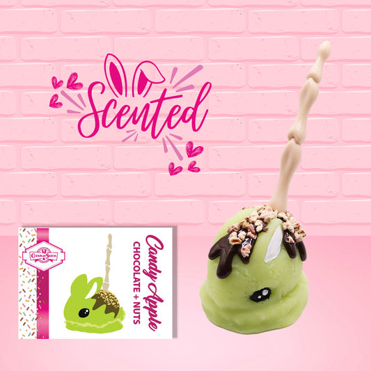 Cute kawaii green bunny with chocolate drizzle and nuts with a boney finger stick.  The front of the character card as well as the word scented is shown.