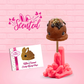 Cute kawaii honey bunny with chocolate drizzle and gold glitter on top of a stick. The front of the character card is shown.