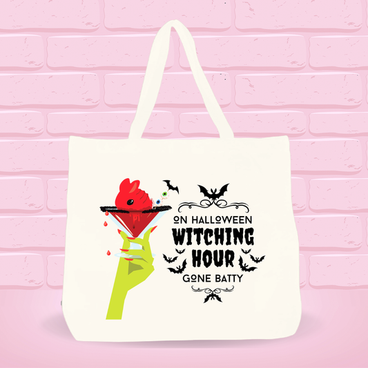A Halloween tote bag with the bloody cranberry design that reads: On Halloween Witching Hour Gone Batty.