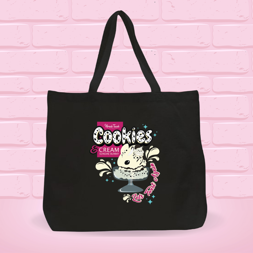 A black canvas tote bag with the cookies and cream bunny design on it.