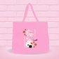 A pink canvas tote bag with the Ikura Sushi Bunny Design on it.