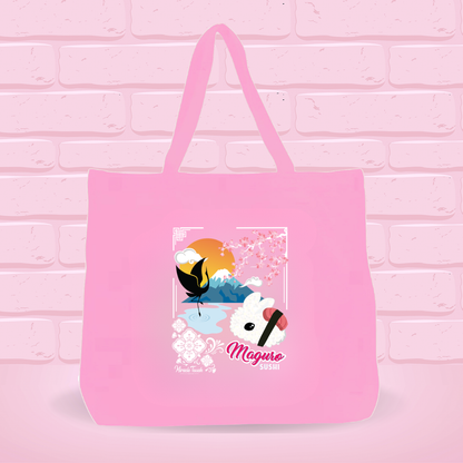 Pink tote bag with Maguro- Tuna Sushi Bunny design and japanese text on a pink brick wall background.