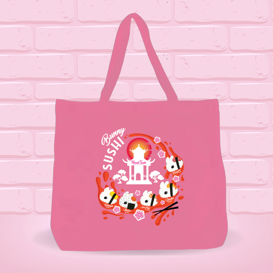 Pink tote bag with a 'New Bunny Sushi set' design on a pink brick wall background