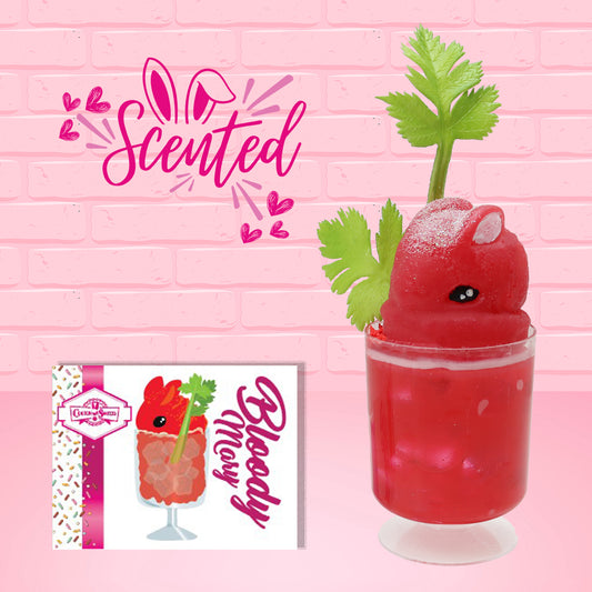 Cute kawaii red bunny on top of a red drink with a celery sticking into it. The front of the character card is shown as well as the word scented.