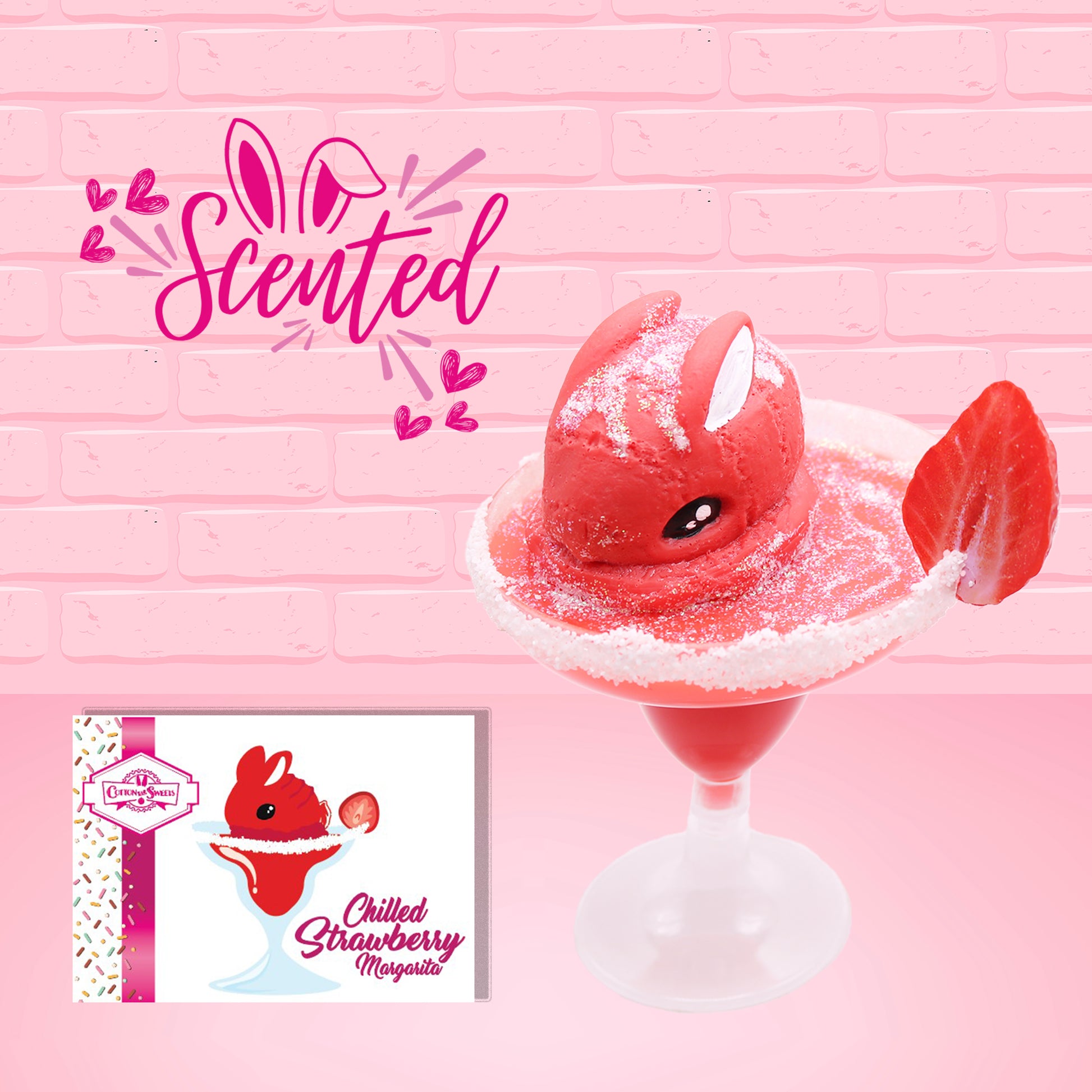 Cute kawaii red bunny in a frosted dish with a slice of strawberry on the rim. The front of the character card is shown, as well as the word scented.