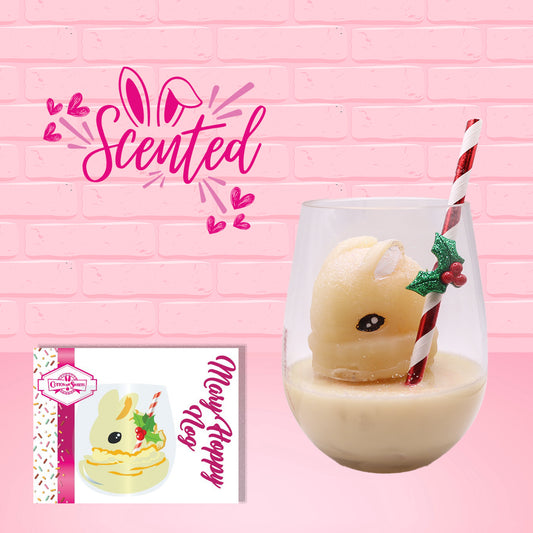Cute kawaii white bunny in a drink with a red and white straw.  The straw has a glittery holly attached to it. The front of the character card as well as the word scented is shown.