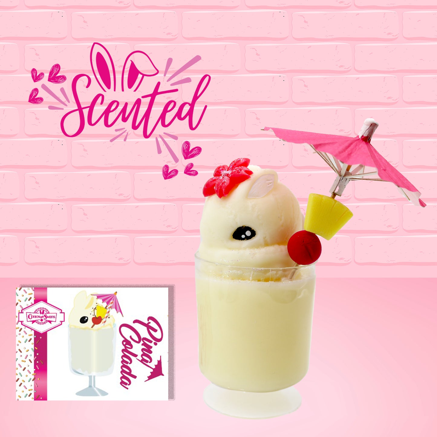 Cute kawaii bunny Pina Colada white drink with a red glittery flower on the top of the bunny in the tall glass. A pink umbrella with a piece of pineapple and cherry sits inside the rim on the side. The front of the character card is shown as well as the word scented.