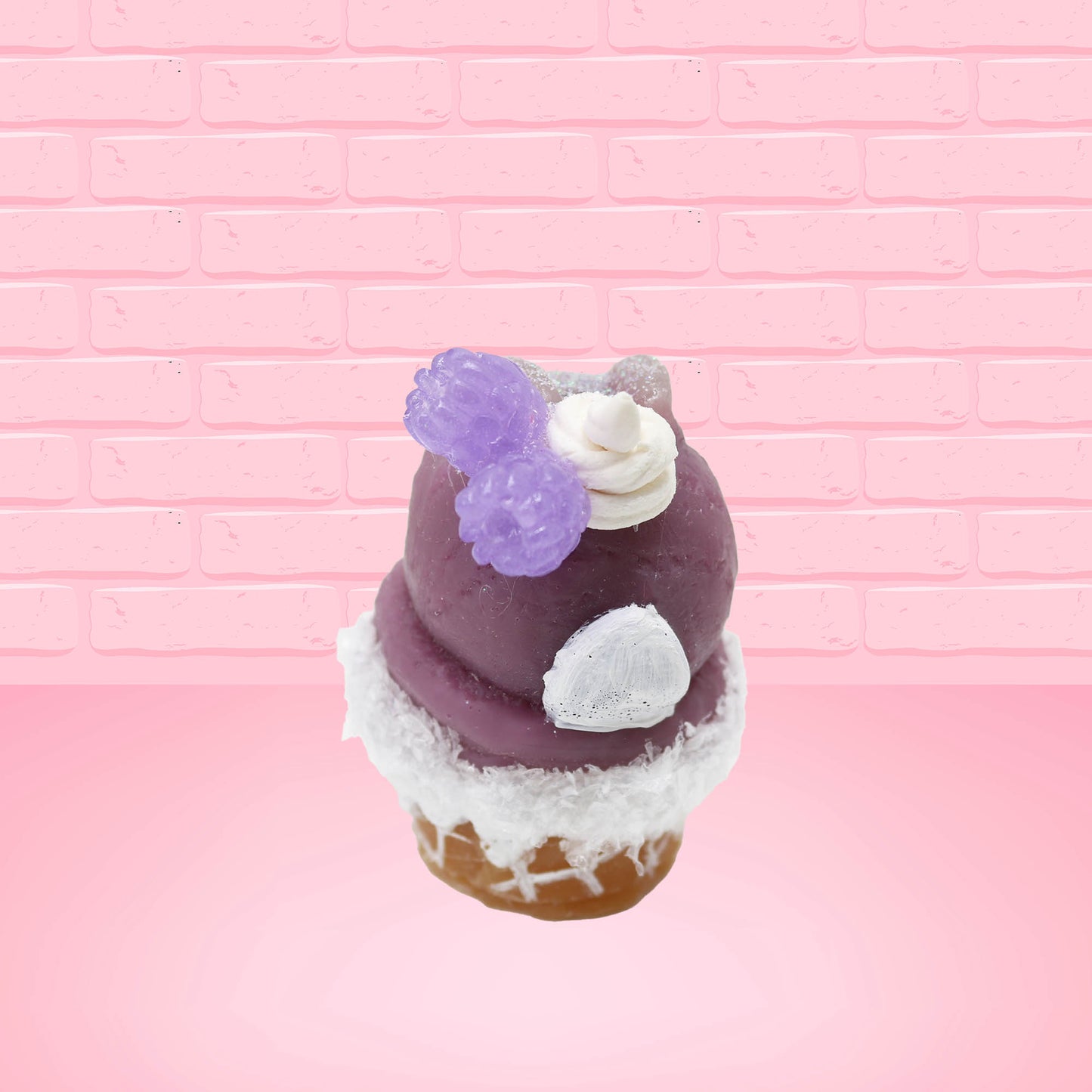Cute kawaii bunny Blackberry Cobbler Dazzle with white glitter and purple raspberries on top near the swirl of whipped cream. This view is from the back.