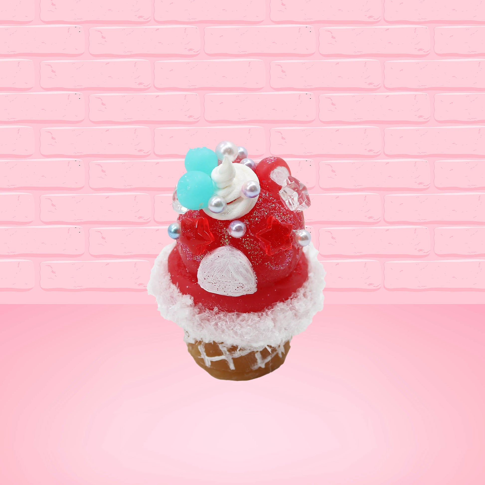 Cute kawaii bunny Cherry Star Blast red ice cream with light blue blueberries, silver pearls, and a clear star near the swirl of whipped cream on the top. This view is from the back.