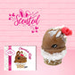 Cute kawaii bunny chocolate ice cream cone with glitter and red raspberries on top of the bunny near the swirl of whipped cream. The front of the character card is shown as well as the word scented.