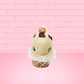 Cute kawaii bunny Cookie Dough ice cream cone with chocolate pieces and drizzle on top of the bunny as well as a cookie near the whipped cream swirl. This view is from the front.