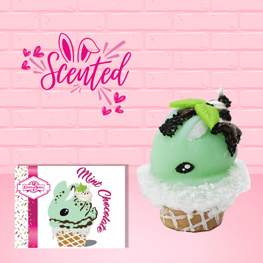 Cute kawaii bunny mint chocolate green ice cream cone with chocolate drizzle and sprinkles near the swirl of the whipped cream, with green mint leaves.  The front of the character card is shown as well as the word scented.