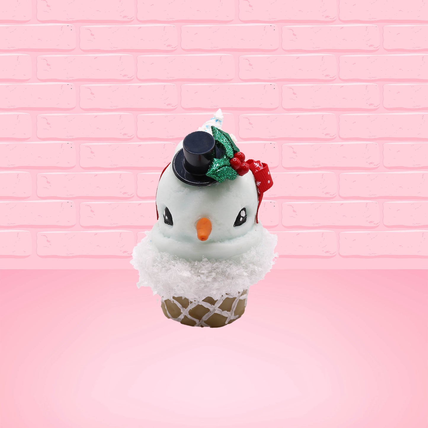 Cute kawaii bunny Snow Bunny light blue ice cream scoop with a carrot nose, red with silver snowflakes ribbon, a black top hat, and holly leaves with berries near the blue glittered whipped cream swirl on the top of the bunny. This view is from the front.
