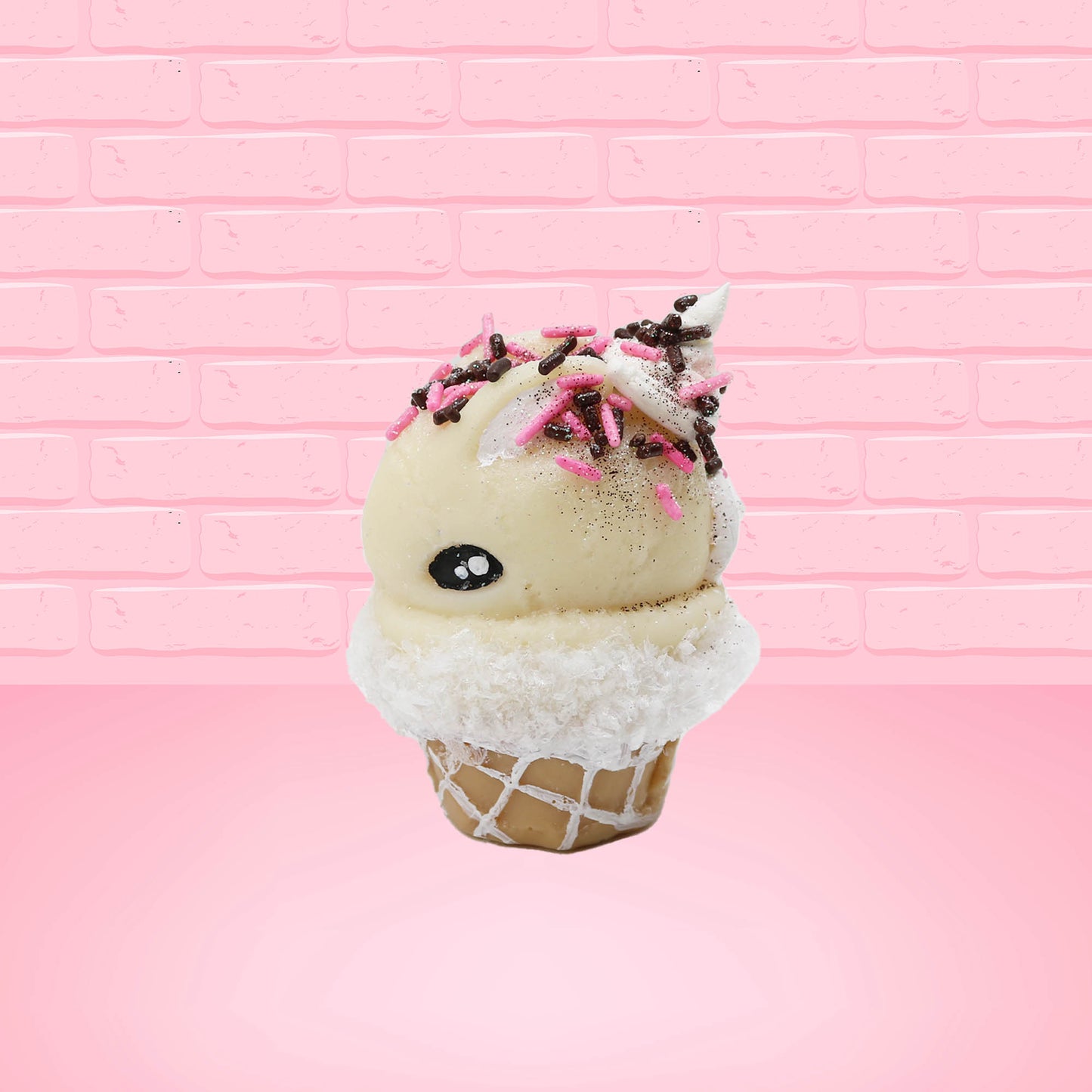 Cute kawaii bunny white ice cream cone Vanilla pink Sprinkle with black and pink sprinkles on top with a swirl of whipped cream. This view is from the side.