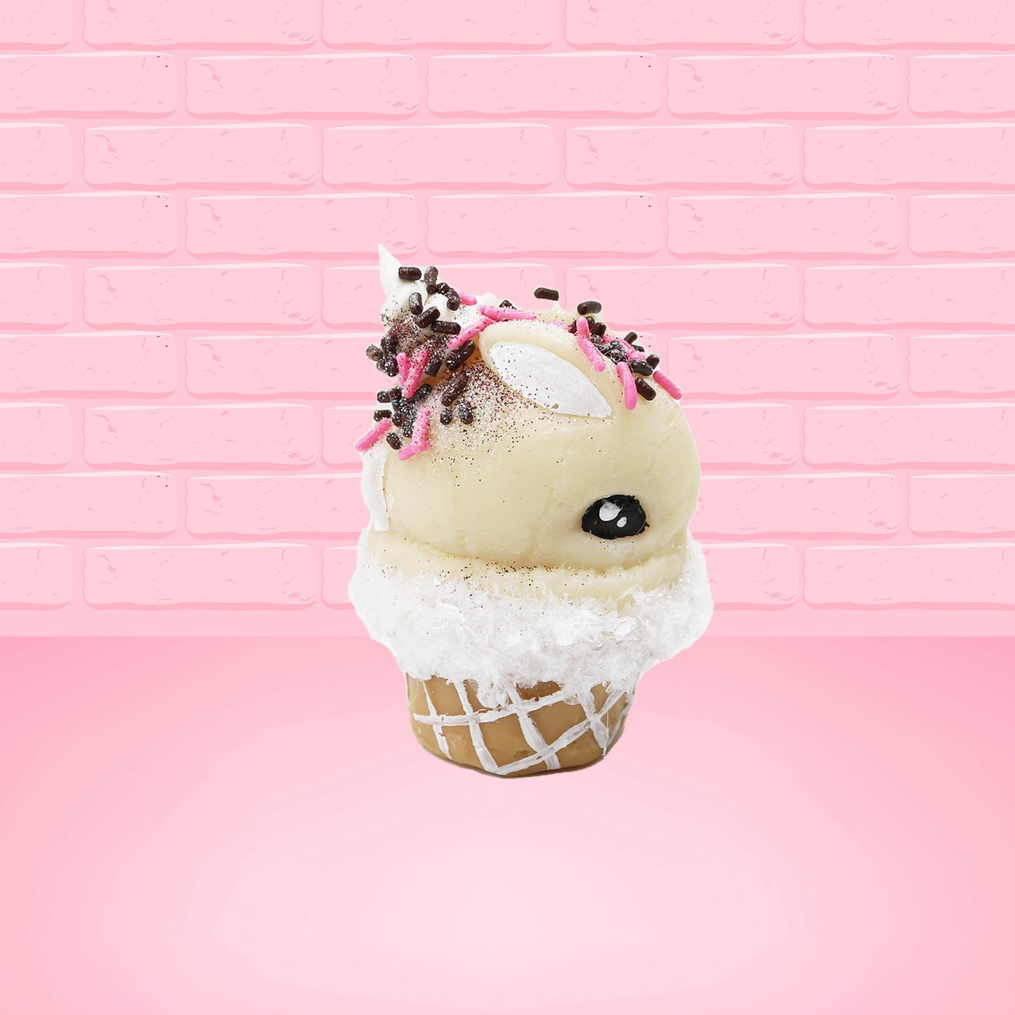 Cute kawaii bunny white ice cream cone Vanilla pink Sprinkle with black and pink sprinkles on top with a swirl of whipped cream. This view is from the other side.
