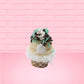 Cute kawaii bunny white ice cream cone Vanilla Teal Sprinkle with black and teal sprinkles on top with a swirl of whipped cream. This view is from the back.