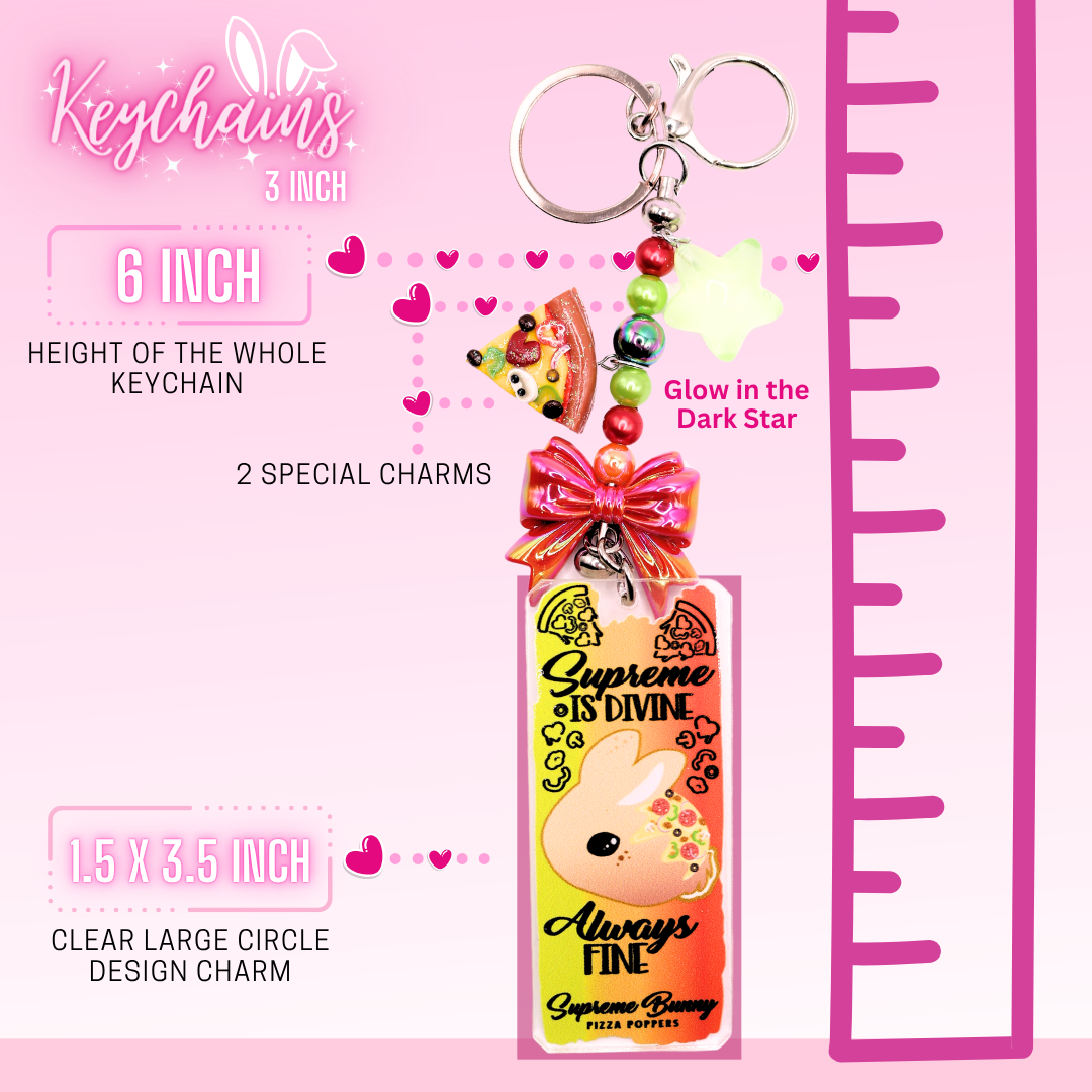 This shows the break down of the keychain, which shows the total length as 6 inches, 2 special charms to each keychain, and a 3.5 inch long clear rectangle design charm at the end.  A ruler on the side shows the overall length of the rectangle charm keychain.