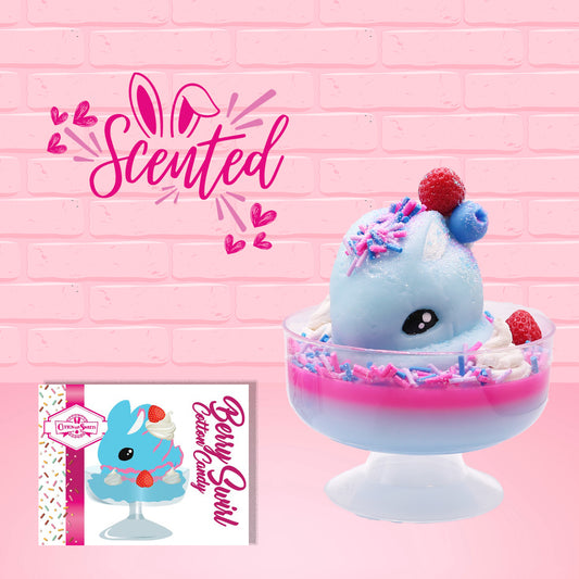 Cute kawaii Berry Swirl Cotton Candy blue ice cream sundae with pink glaze, pink blue and white sprinkles, strawberries and whipped cream swirls in the dish.  There are sprinkles, a blue berry, and strawberry on the top of the bunny near the swirl of the whipped cream. The front of the character card is shown as well as the word scented.  