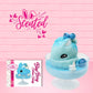 Cute kawaii Blue Berry Cotton Candy ice cream sundae with blue berries and swirls of whipped cream in the dish. The bunny has two blue berries on the top near the swirl of whipped cream on the back. The front of the character card is show, as well as the word scented. 