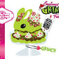 Cute kawaii ice cream sundae character card front that shows the artwork. The artwork shows Emotional Grinch Fudge sundae which has a sign and green white and red heart sprinkles inside of the dish as well as swirls of whipped cream. The bunny has chocolate glaze, peppermint candies and a swirl of whipped cream on it’s head.