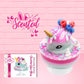 Cute kawaii unicorn bunny Irresistible Sugary Berry light blue and pink sundae with light blue and pink sprinkles with whipped cream swirls in the dish.  The unicorn bunny has blue berries and red raspberries on top near the whipped cream swirl with white drizzle coming down.  The front of the character card is shown, and the word scented.