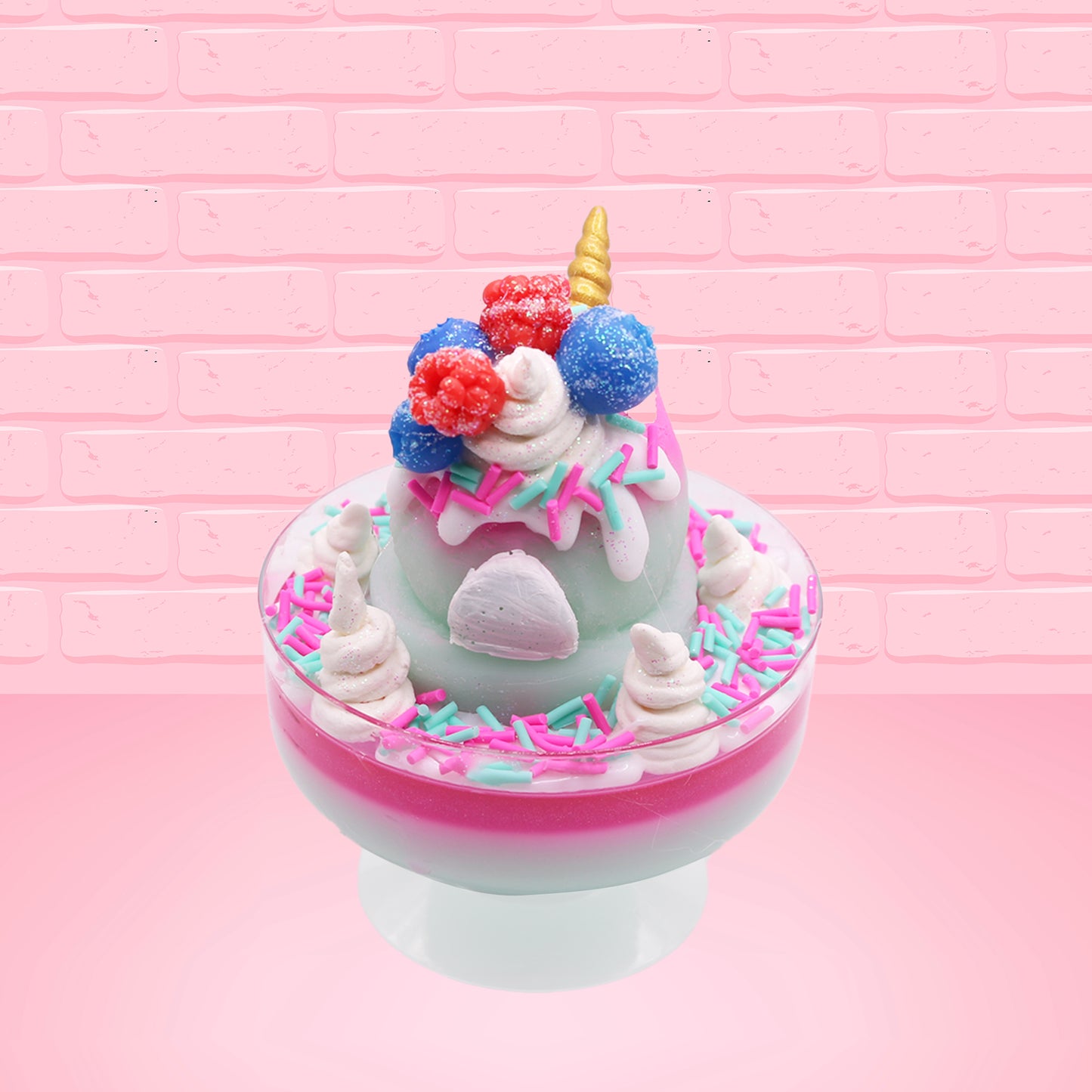 Cute kawaii unicorn bunny Irresistible Sugary Berry light blue and pink sundae with light blue and pink sprinkles with whipped cream swirls in the dish.  The unicorn bunny has blue berries and red raspberries on top near the whipped cream swirl with white drizzle coming down. This view is from the back.