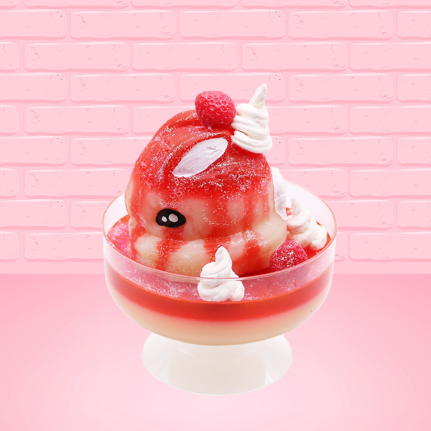 Cute kawaii bunny new strawberry cheesecake white ice cream with red translucent glaze, strawberries, and swirls of whipped cream in the dish. The bunny has red glittery glaze dripping over the head with a strawberry and a swirl of whipped cream on top. This view is from the side.