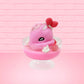  Cute kawaii bunny Pink Swirl Cotton Candy pink ice cream sundae with strawberries and swirls of whipped cream in the dish. The bunny has two strawberries near the swirl of whipped cream on top and white glitter.  This view is from the front with a slight angle.