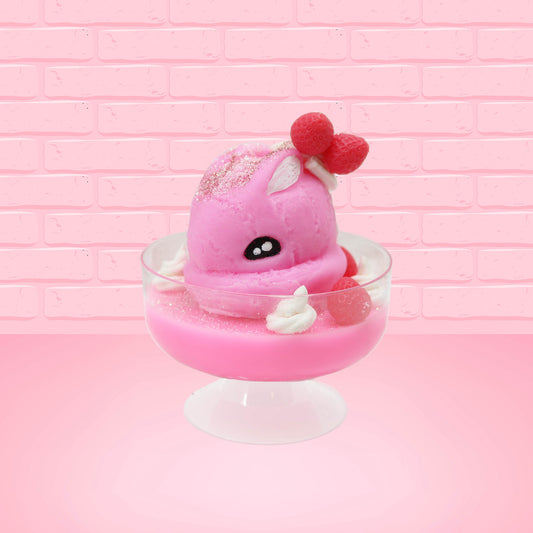  Cute kawaii bunny Pink Swirl Cotton Candy pink ice cream sundae with strawberries and swirls of whipped cream in the dish. The bunny has two strawberries near the swirl of whipped cream on top and white glitter.  This view is from the front with a slight angle.