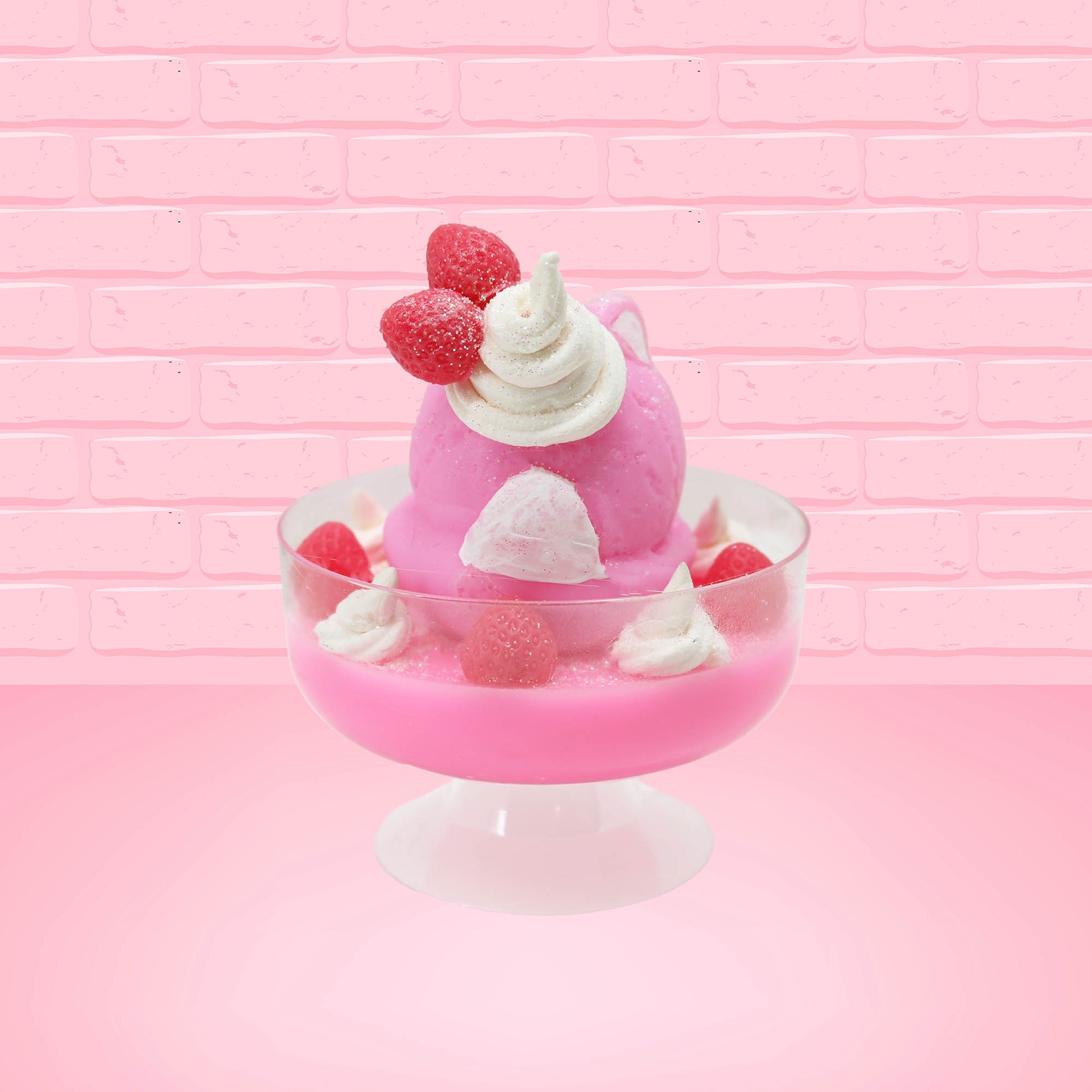 Cute kawaii bunny Pink Swirl Cotton Candy pink ice cream sundae with strawberries and swirls of whipped cream in the dish. The bunny has two strawberries near the swirl of whipped cream on top and white glitter.   This view is from the back.