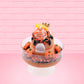 Cute kawaii Pumpkin King Bunny orange ice cream sundae with black glaze, orange sprinkles and pumpkin faces in the dish.  The bunny has a golden crown and orange slice on top next to the swirl of whipped cream. This view is from the back.