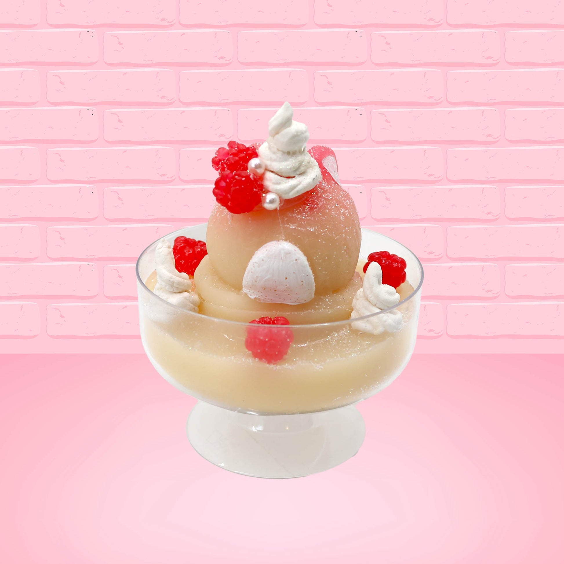 Cute kawaii bunny raspberry cheesecake white ice cream with raspberries and whipped cream swirls in the dish. The bunny has two raspberry on the back near the swirl of whipped cream and covered with white glitter. This view is from the back.
