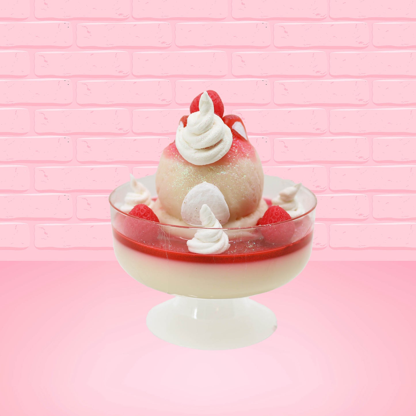 Cute kawaii bunny strawberry cheesecake white ice cream with red glaze, strawberries, and whipped cream swirls in the dish. The bunny has a strawberry on top between the ears, with a swirl of whipped cream on the back. This view is from the back.