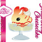 Cute kawaii bunny ice cream character card front which shows the digital artwork. The artwork shows Strawberry Cheesecake white ice cream with red translucent glaze, strawberries, and swirls of whipped cream in the dish. The bunny has red glittery glaze dripping over the head with a strawberry and a swirl of whipped cream on top.