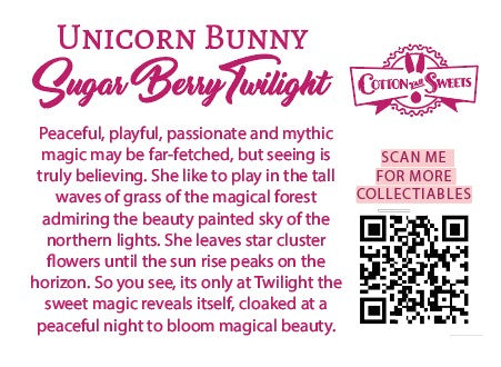 The back of the character card, which reads: Unicorn Bunny Sugar Berry Twilight, Peaceful, playful, passionate and mythic magic may be far-fetched, but seeing is truly believing.  She like to play in the tall waves of the grass of the magical forest admiring the beauty painted sky of the northern lights. She leaves start cluster flowers until the sun rise peaks on the horizon. So you see, it’s only at Twilight the sweet magic reveals itself, cloaked at a peaceful night to bloom magical beauty. A QR code is 