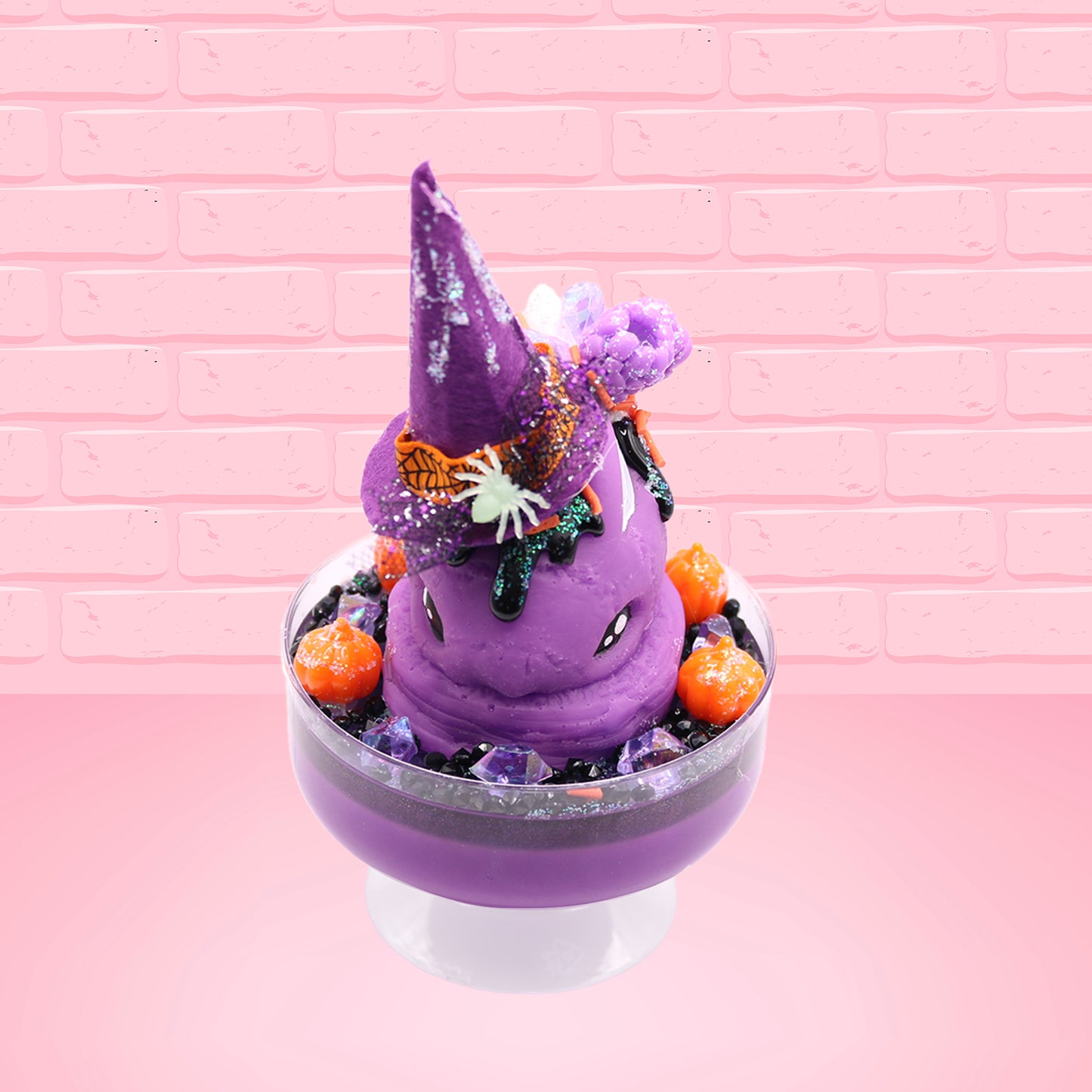 Cute kawaii witch bunny Blair purple ice cream with purple crystals and pumpkins on top of a layer of glittery black translucent layer. The bunny has a purple witch’s hat, with purple raspberries and a whipped cream swirl on top, with black glittery glaze and orange sprinkles. This view is from the front.