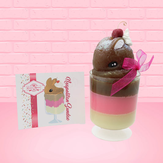 Cute Kawaii bunny tall Neapolitan three layered ice cream sundae with a cherry and swirl of whipped cream on top.  The top of the bunny is covered with white glitter, and has a pink bow.  The front of the character card is shown.